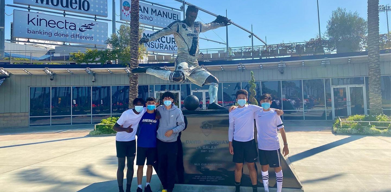 Barca Residency Academy players posing for a photo outside of the Dignity Health Center in LA ahead of the U.S. Boys YNT IDC