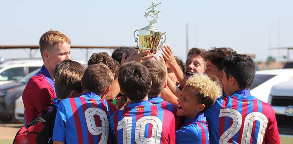 Barca Residency Academy U14 team celebrating their championship win at the 2021 Tuzos Callenge