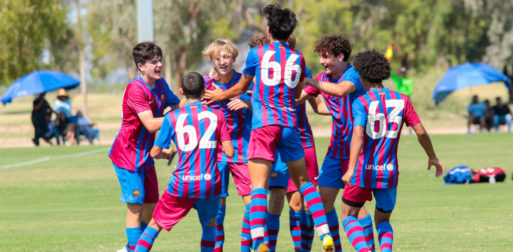 Barca Residency Academy U16 Pre-Academy team celebrating a goal