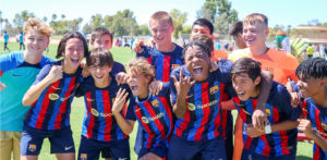 Barca Residency Academy U-16s celebrating their 5-0 win over Nomads SC
