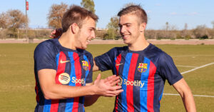 Barca Residency Academy twins Andrew and Nicholas De Lapp embracing on the field