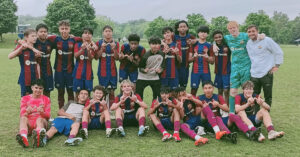 Barca Residency Academy U-15s celebrating after winning their group at the 2024 MLS Next Flex and securing a spot in the 2024 MLS Next Cup Playoffs